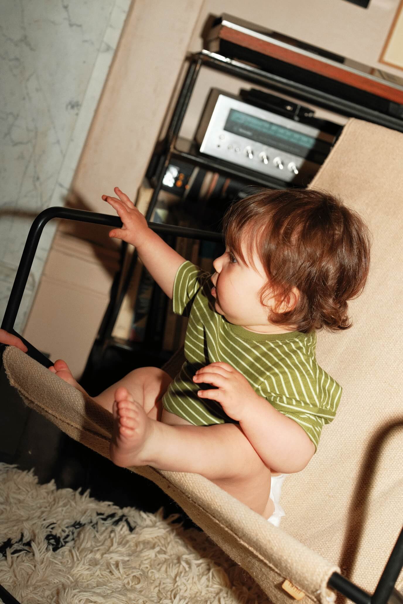 baby in an orange fisherman hat
